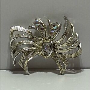 Elegant Silver Brooch with Gem Accents